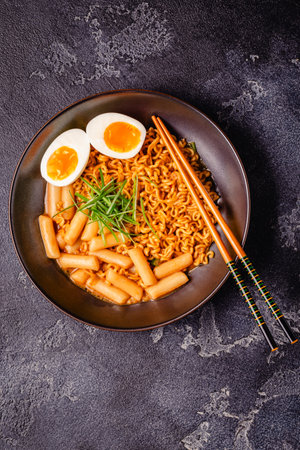 Spicy Rapokki - Korean tteokbokki rice cake and ramen noodle. Korean food style.の写真素材