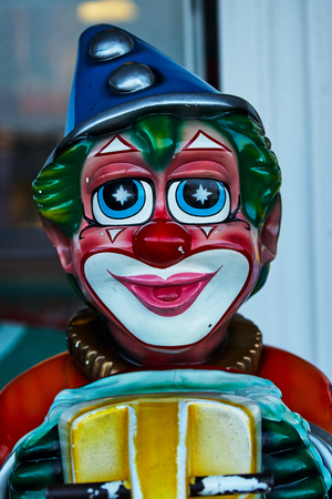 Porcelain clown vintage circus colourfull head blue hat starsの写真素材