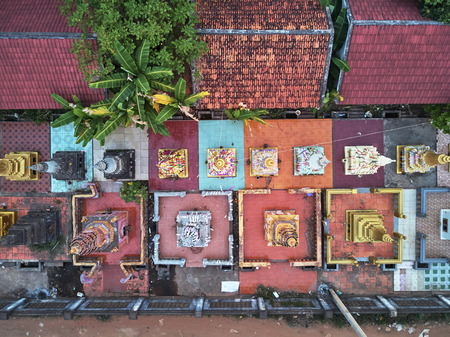 Aerial drone view topdown eagle eye of a traditionnal temple pagoda cemetery in siem reap cambodia asiaの写真素材