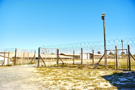 Robben Island (Afrikaans: Robbeneiland) island in Table Bay, west of the coast of Bloubergstrand, Cape Town, South Africa.の写真素材