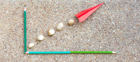 red paper plane as graph in business financeの写真素材