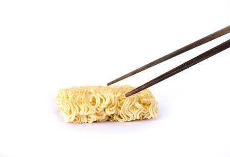isolated instand noodle and chopsticksの写真素材