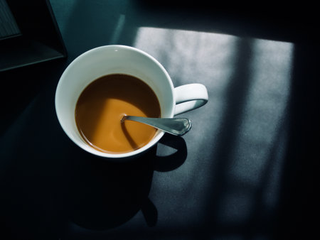 Coffee in the Morning Shadow and Sunshineの写真素材