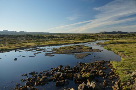 Small stream running through Iceland landscapeの写真素材