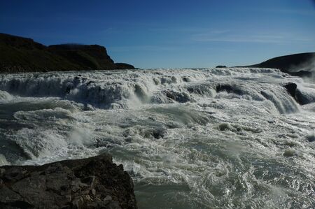 Close up of large waterfall in Icelandの写真素材