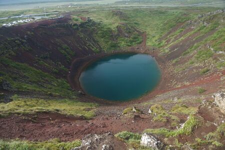 Beautiful volcanic crater with small lake located in southern Icelandの写真素材