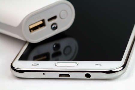 Mobile phone Close- up on a white background .の写真素材