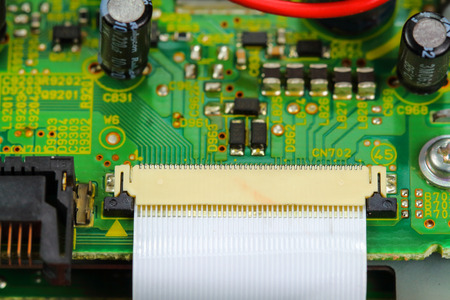 Closeup electronic circuit board background.
