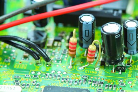 Closeup electronic circuit board background.