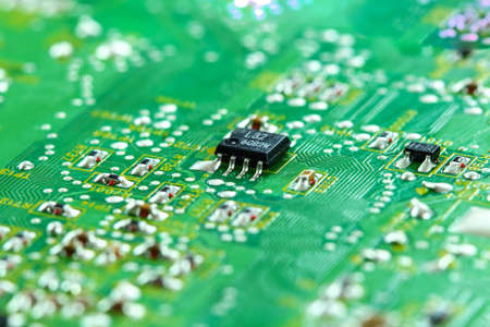 Closeup electronic circuit board background.