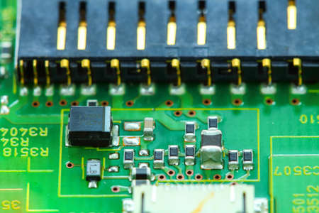 Closeup electronic circuit board background.