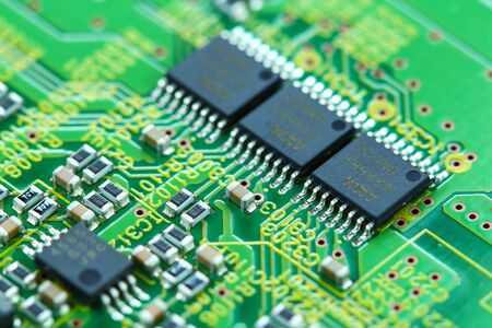 Closeup electronic circuit board background.