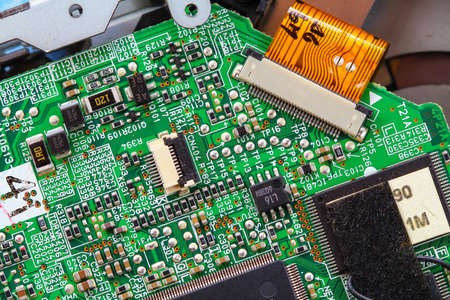 Closeup electronic circuit board background.