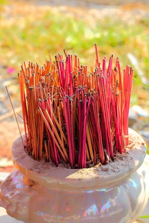 Incense sticks in the incense burner at the temple.の写真素材