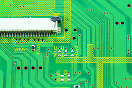 Closeup electronic circuit board background.