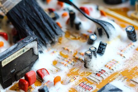 Closeup electronic circuit board background.