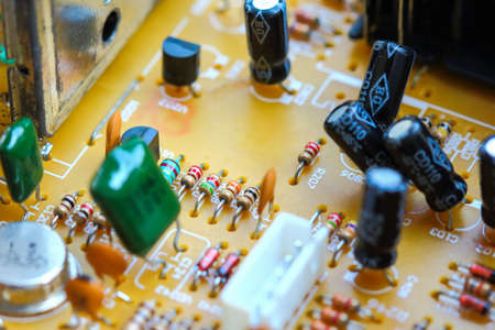 Closeup electronic circuit board background.