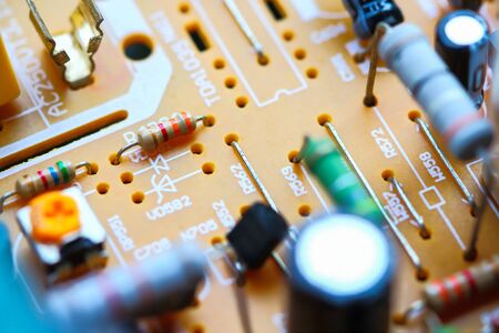 Closeup electronic circuit board background.