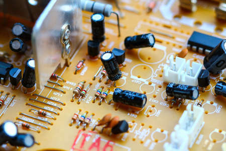 Closeup electronic circuit board background.
