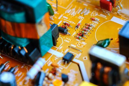 Closeup electronic circuit board background.