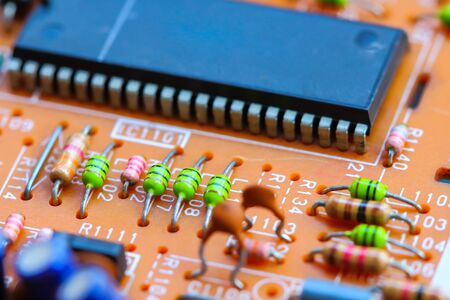 Closeup electronic circuit board background.