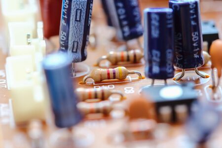 Closeup electronic circuit board background.
