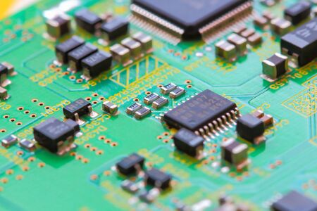 Closeup electronic circuit board background.