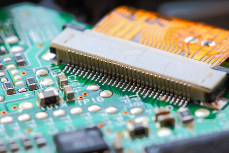 Closeup electronic circuit board background.