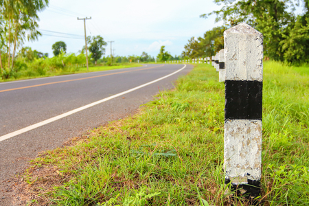 Curved guide on rural roads.の写真素材