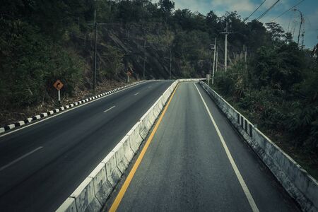Road up the mountain with dangerous curves.の写真素材