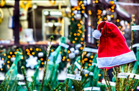 Santa hat on the Christmas treein the streetの写真素材