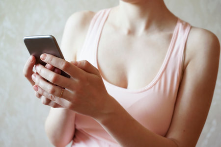Close up of human body parts with gadgetsの写真素材