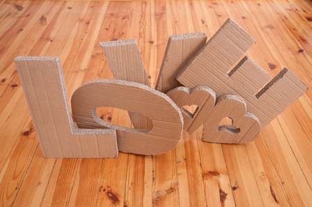 LOVE sign and hearts  made of cardboardの写真素材