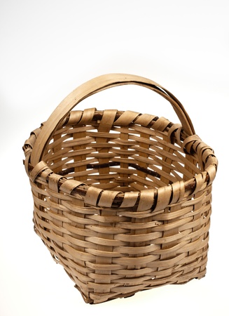 A wicker basket on white backgroundの写真素材