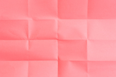 Empty, folded, red sheet of paperの写真素材