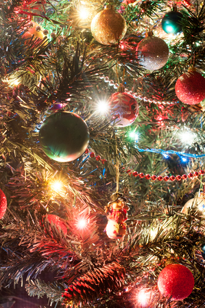 Part of decorated christmas tree with lightsの写真素材