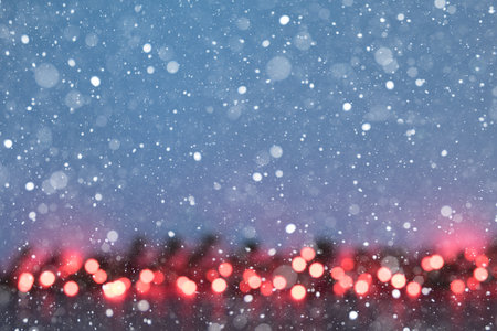 Christmas glowing garland with red lights - soft focus, bokehの写真素材