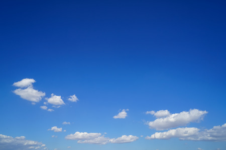 Group of free form floating white cloud as per imagination with bright blue sky background on sunshine day, Greeceの写真素材
