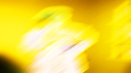 Abstract motion blur effect. Blurred light trails on yellow background.の写真素材