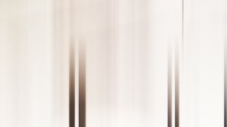 Abstract blurred background with vertical stripes in light and dark colors. Long exposure.