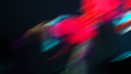 Abstract motion blur effect. Colorful light trails on black background.の写真素材