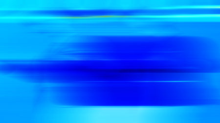 abstract blue background with some smooth lines in it and some motion blurの写真素材