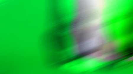 abstract green background with some smooth lines in it and some spotsの写真素材