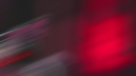 abstract background with some smooth lines in it and a red tintの写真素材