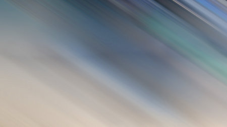 Light abstract gradient motion blurred background. Colorful lines texture wallpaper.