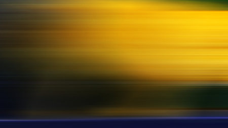 Abstract background of yellow and green colors. Horizontal long exposure.