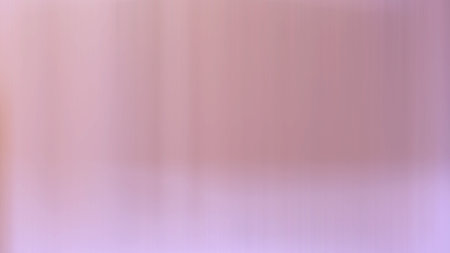 abstract pink background with some smooth lines in it and some spots on itの写真素材