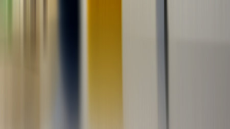 Bright colored blurred brushstrokes as multicolored flashes for an abstract background. Toned.