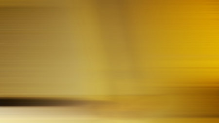 Bright yellow horizontal blurred background or bokeh light effect, abstract textureの写真素材