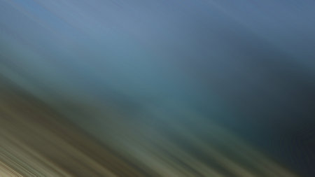 Light abstract gradient motion blurred background. Colorful lines texture wallpaper.